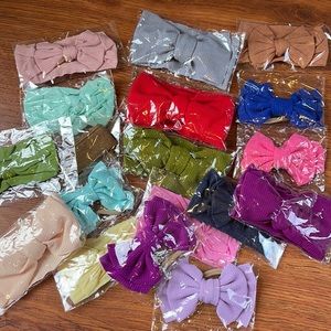 18 unopened baby/toddler headband bows